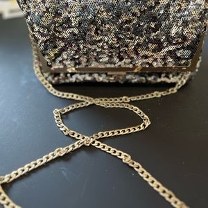 Women’s sequin clutch.